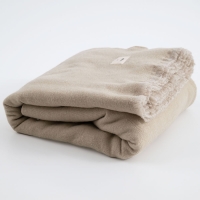 Natürliche Wolle und klassisches Design der MOYHA Tagesdecke Herringbone Beige