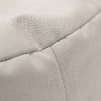 Eleganter VOX Looz Outdoor Pouf Grau Klein Teflon, 50x52 cm, bei Sonnenuntergang