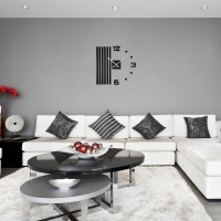 3D Wanduhr Lamellen Schwarz 60 cm, modernes Design mit weißen Details.